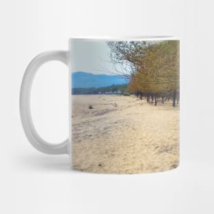 White sand beach with pine trees and selfmade bamboo bench Mug